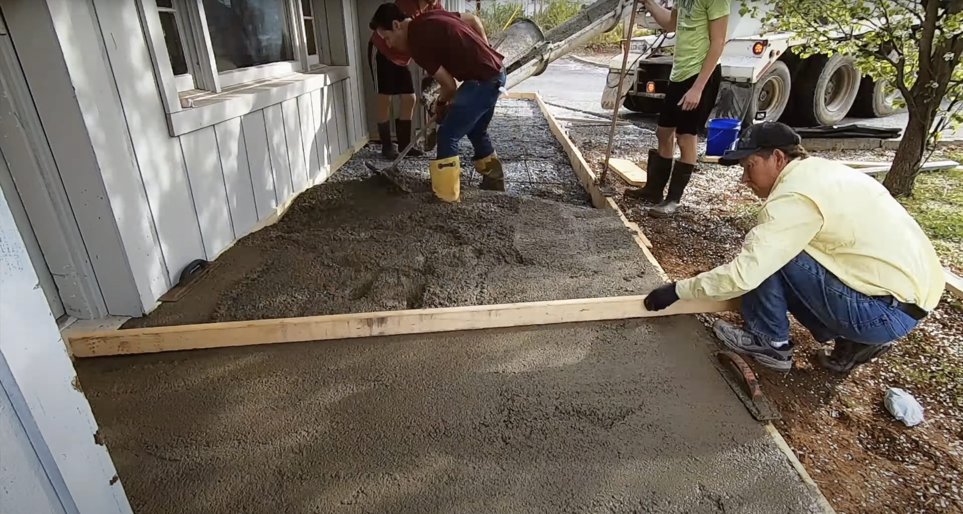 Experienced team providing quality concrete installation services Professional concrete crew working on residential project installation